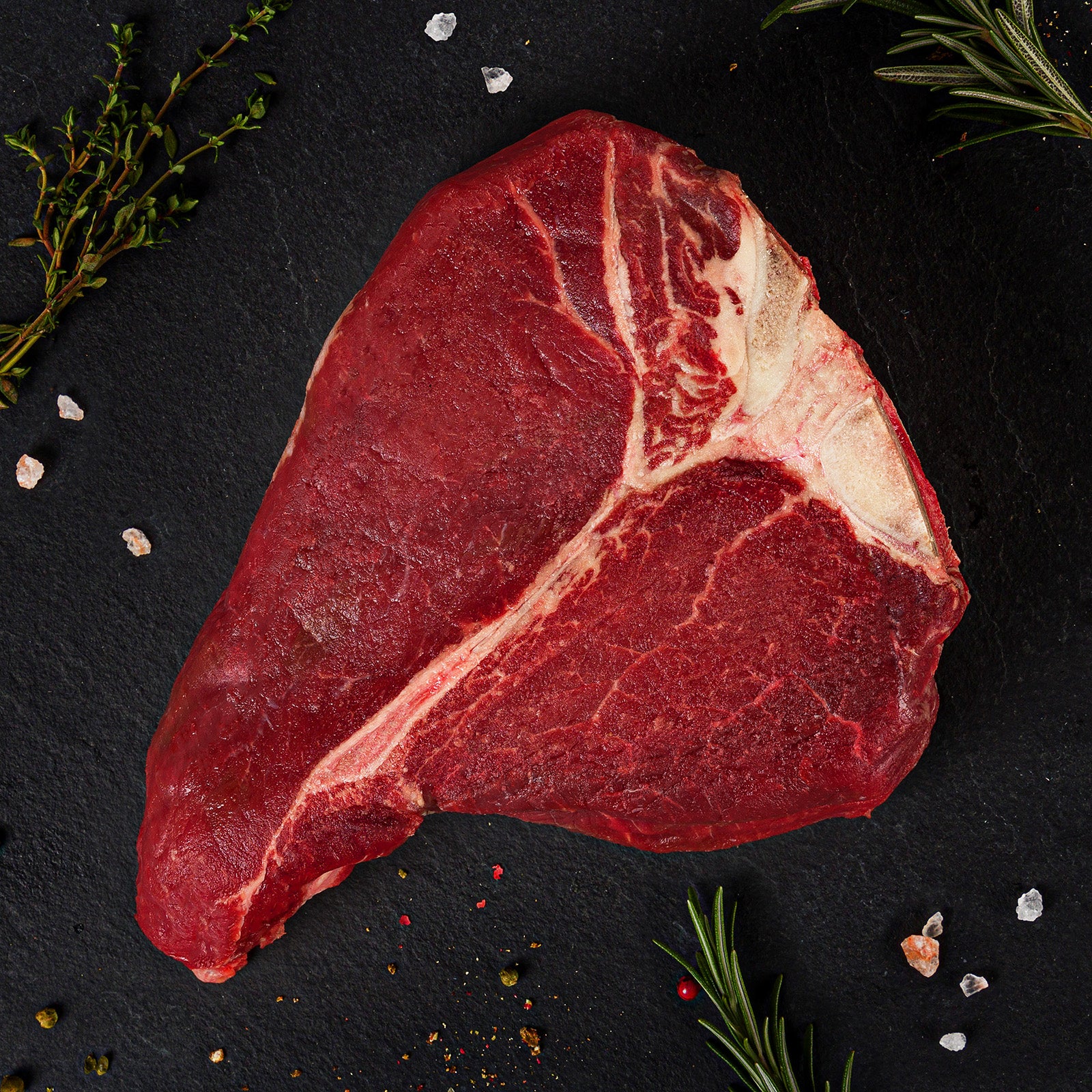 Man sieht ein 800-Gramm-Dry-Aged-Porterhouse-Steak, das man bei Kauf dein Steak kaufen kann.